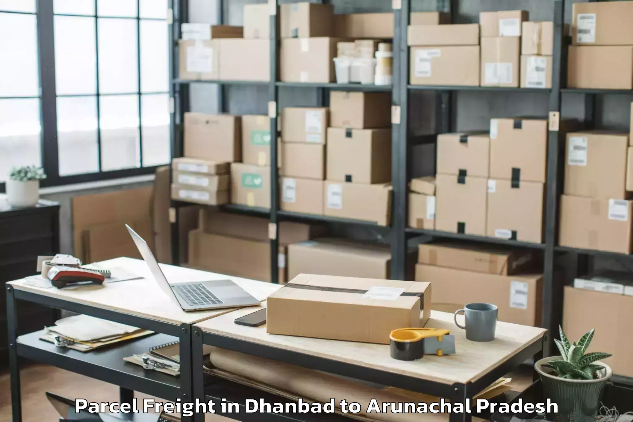 Top Dhanbad to Koronu Parcel Freight Available